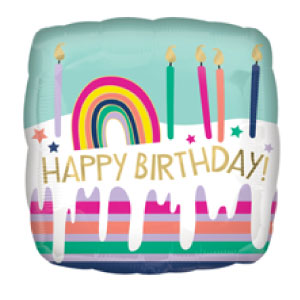 square mylar balloon with frosting, candles and a rainbow